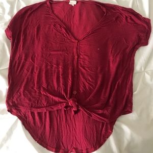 red flowy shirt